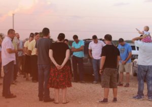 Church Members Gathered in Prayer